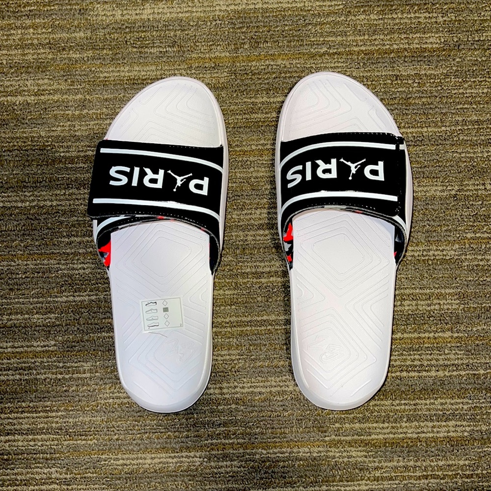Brand new Jordan X Paris Saint Germain slides. Size US 11.